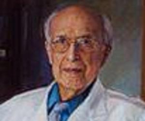 George W. Comstock George W. Comstock