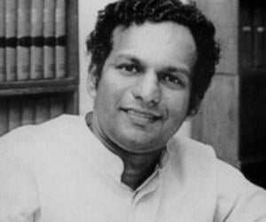 Neelan Tiruchelvam Neelan Tiruchelvam