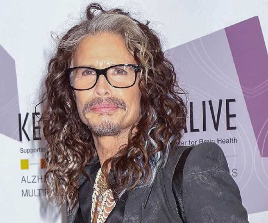 Singer Steven Tyler and his son Taj Tyler arrive for the premiere of