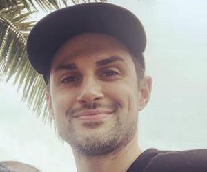 Andrew J West