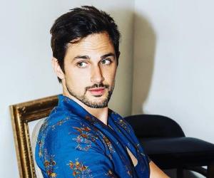 Andrew J West